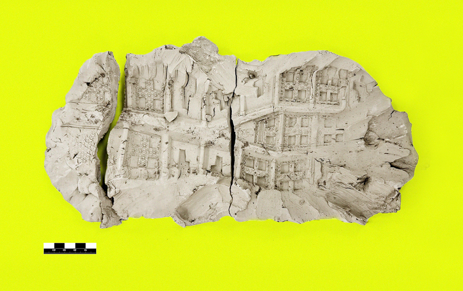 Shoe print fossil on a neon yellow background.